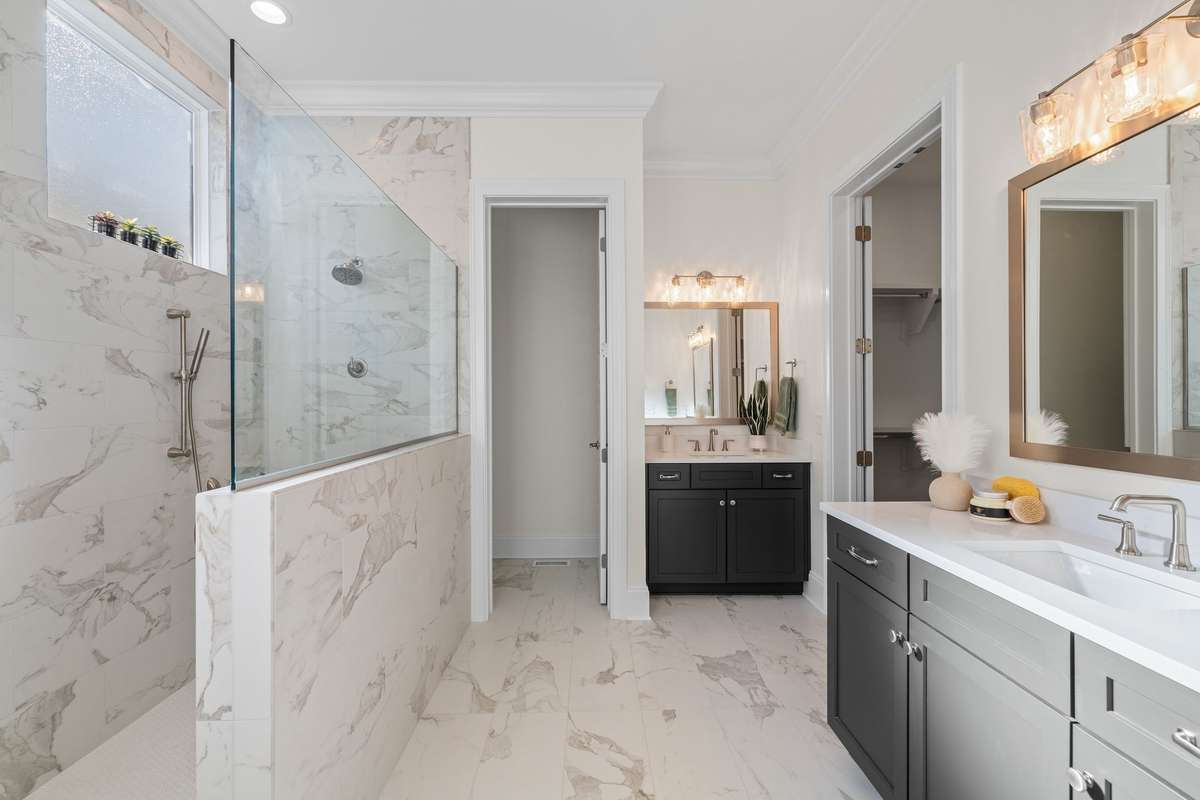 Photos represent a model home of the same floor plan and are not the actual home being constructed. Interior finishes, selections, and colors will be different.