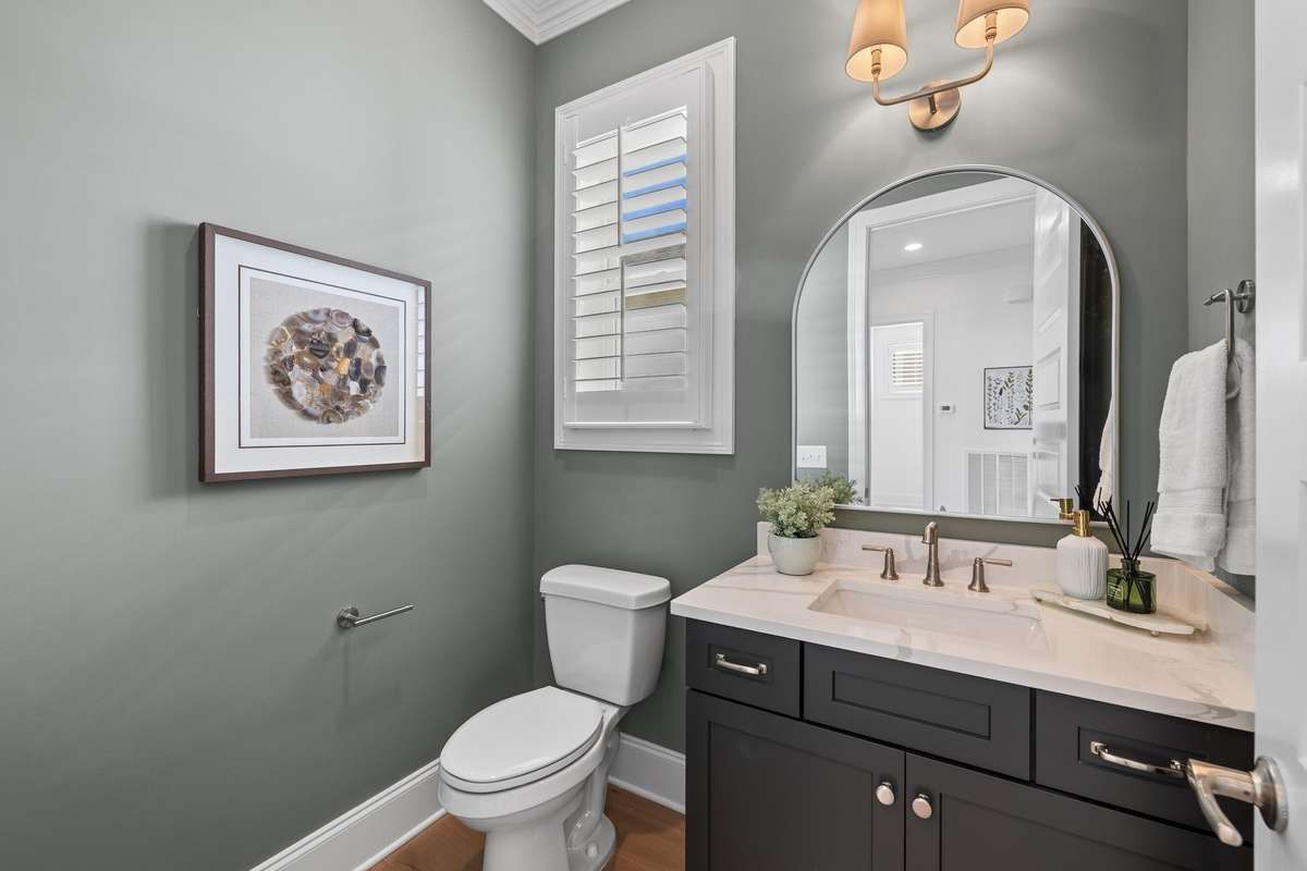 Photos represent a model home of the same floor plan and are not the actual home being constructed. Interior finishes, selections, and colors will be different.