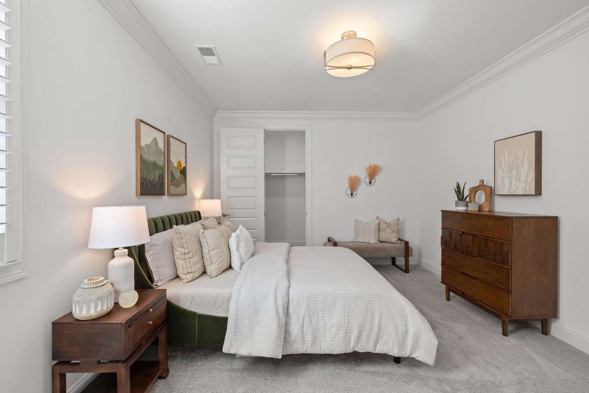 Photos represent a model home of the same floor plan and are not the actual home being constructed. Interior finishes, selections, and colors will be different.