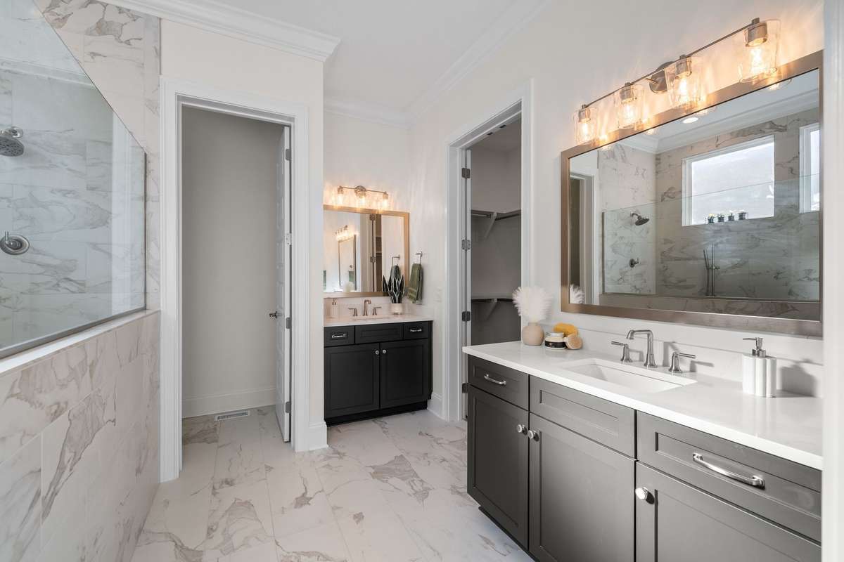 Photos represent a model home of the same floor plan and are not the actual home being constructed. Interior finishes, selections, and colors will be different.
