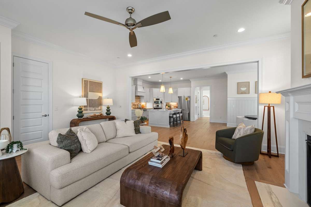 Photos represent a model home of the same floor plan and are not the actual home being constructed. Interior finishes, selections, and colors will be different.