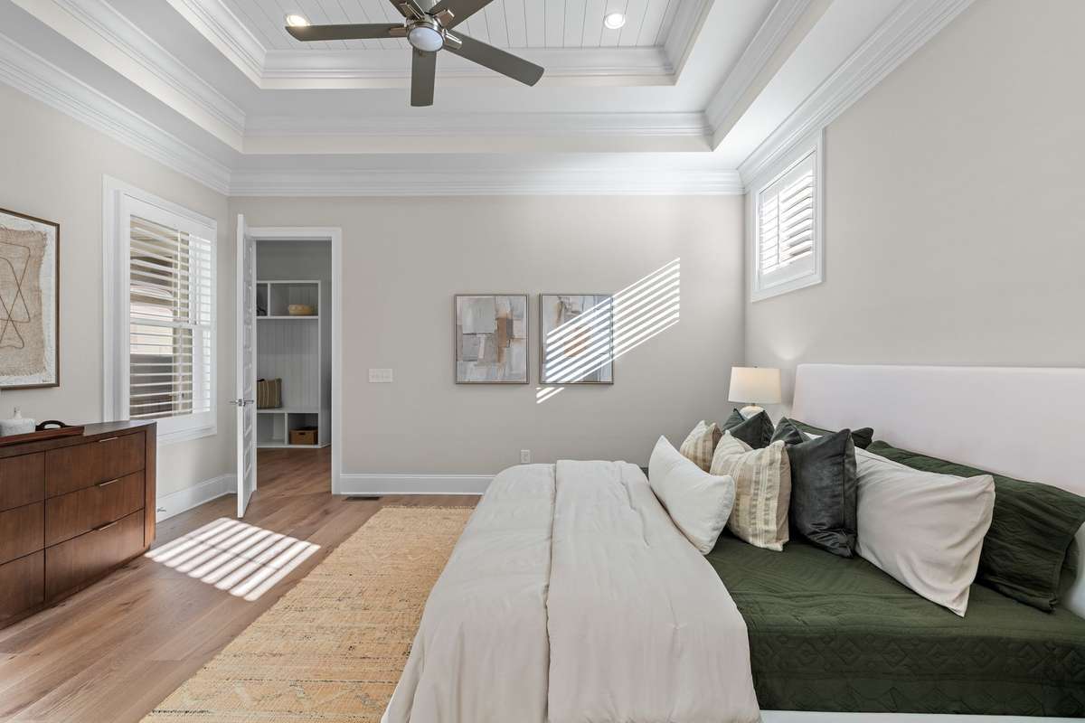 Photos represent a model home of the same floor plan and are not the actual home being constructed. Interior finishes, selections, and colors will be different.