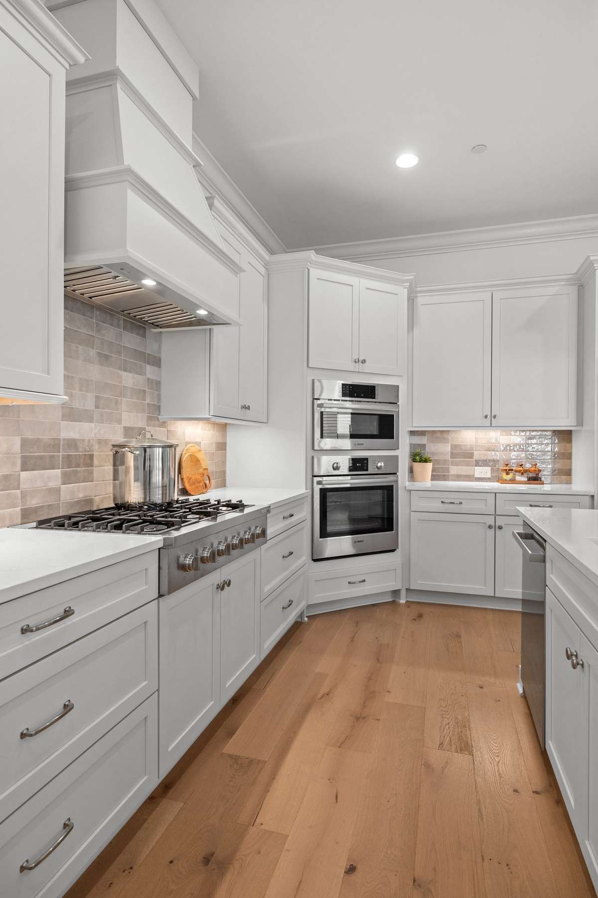 Photos represent a model home of the same floor plan and are not the actual home being constructed. Interior finishes, selections, and colors will be different.