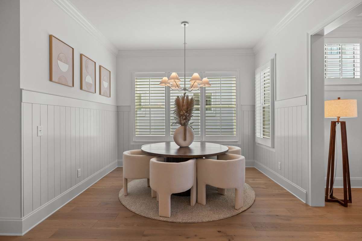 Photos represent a model home of the same floor plan and are not the actual home being constructed. Interior finishes, selections, and colors will be different.