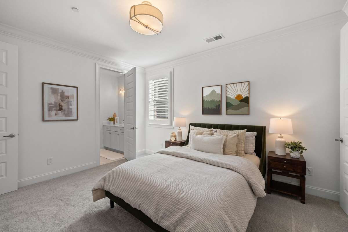 Photos represent a model home of the same floor plan and are not the actual home being constructed. Interior finishes, selections, and colors will be different.