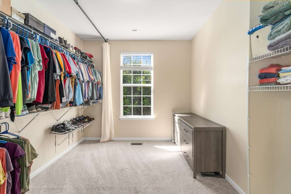 Primary walk in closet.