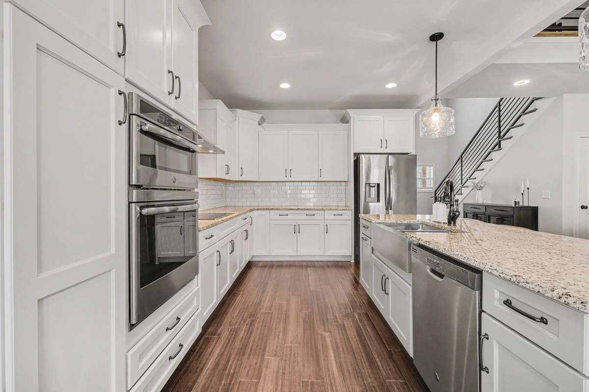 Tons of cabinet space as well as counter top! Don't forget the double wall oven for all you chefs!