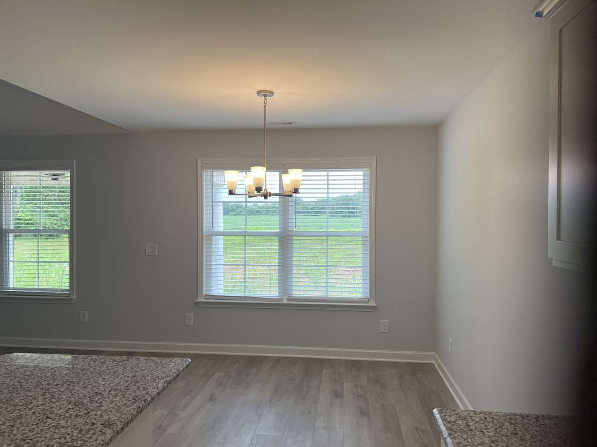 Photo of different home but same floor plan. Finishes will vary.