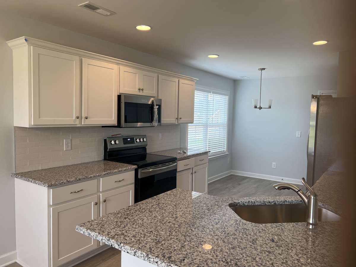 Photo of different home but same floor plan. Finishes will vary.
