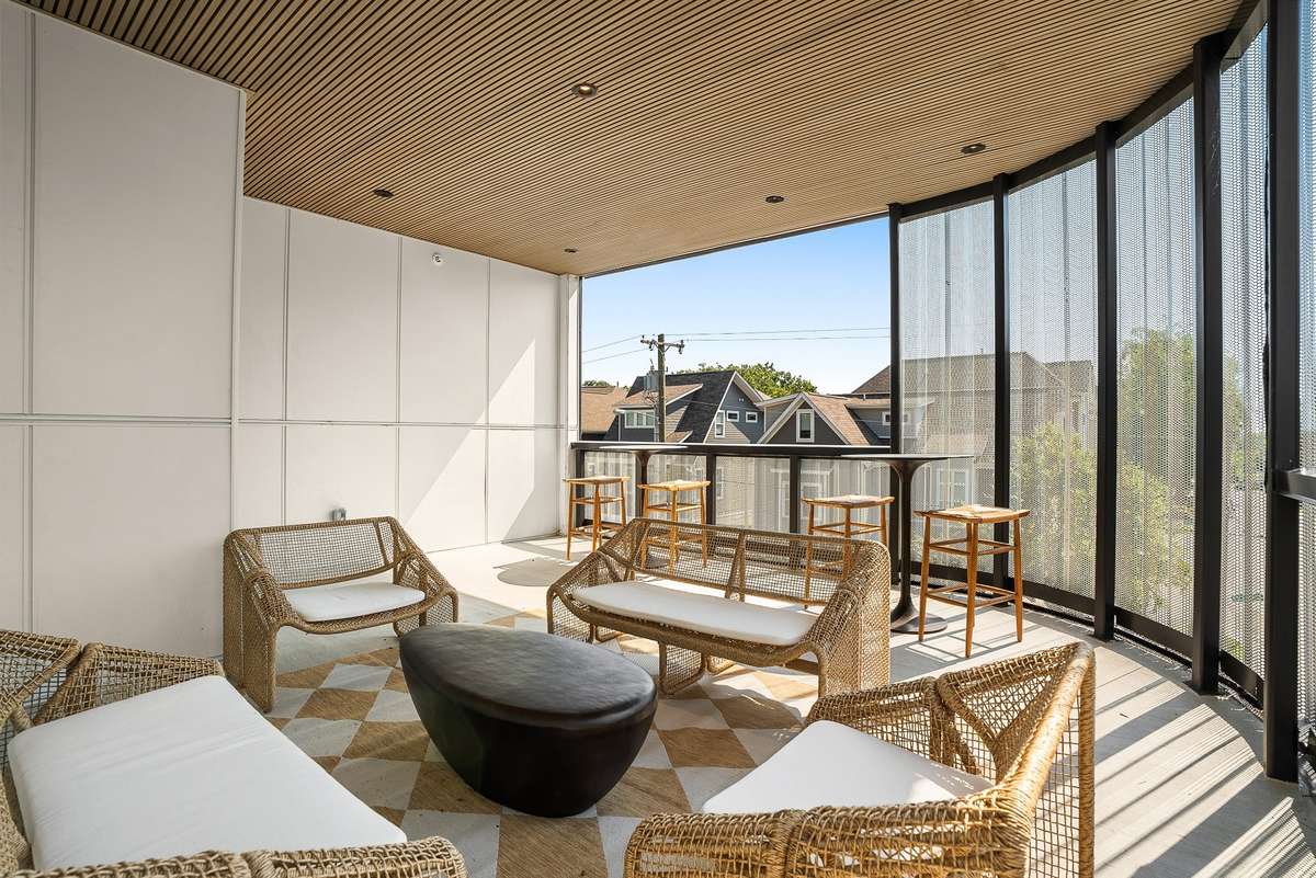 One of two outdoor common area porches.