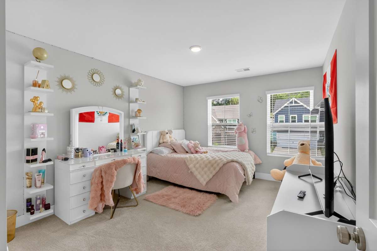 Bedroom featuring a spacious oversized closet.