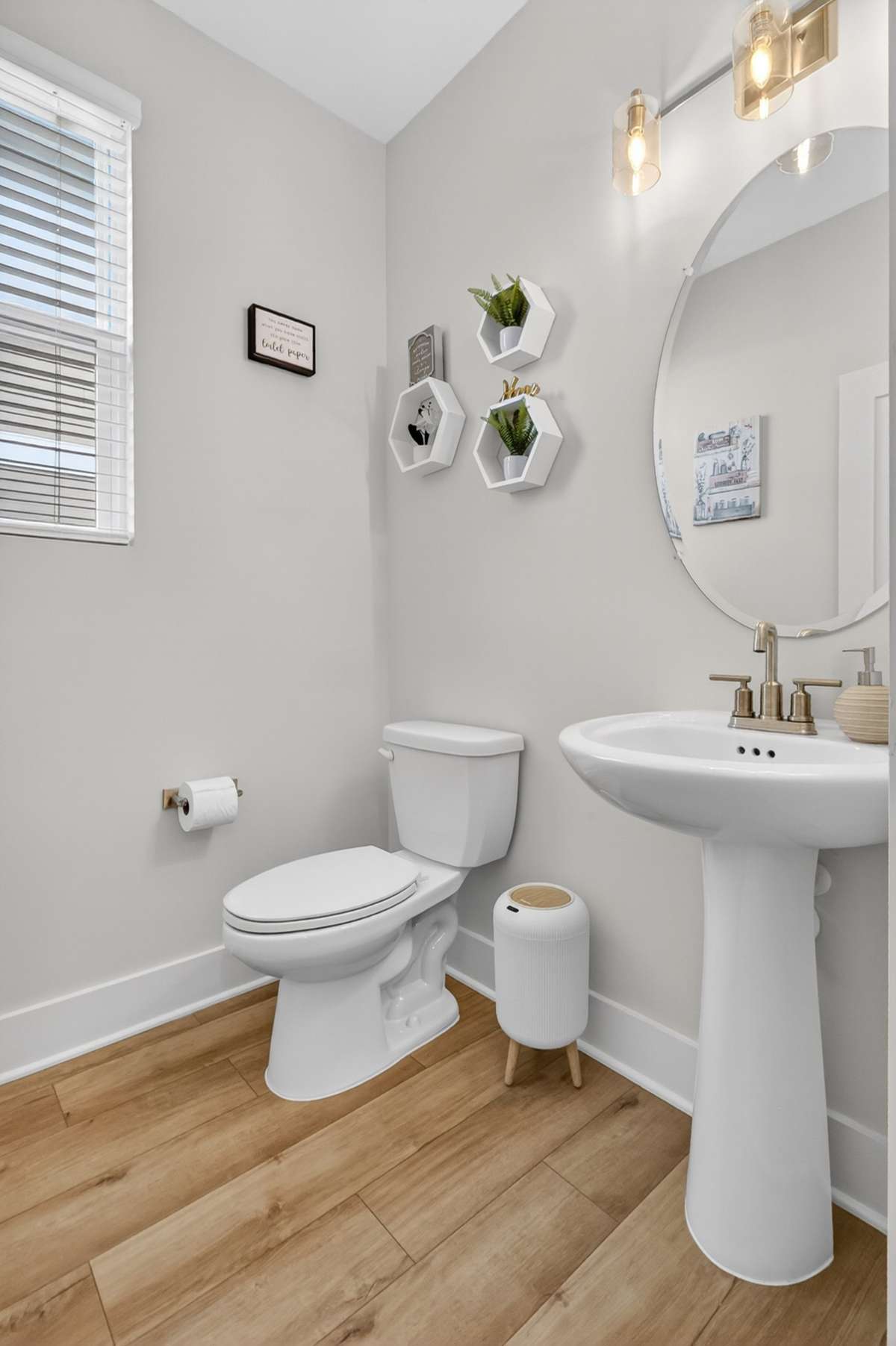 Primary-level half bath for added convenience.