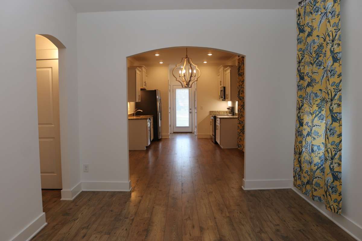 In the Den looking toward the Dining Area and Kitchen