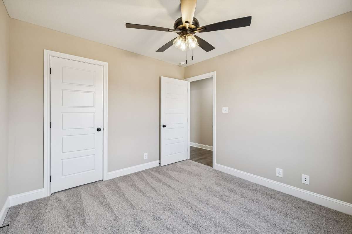 Sample pictures of a previous build showing the Meg Floor Plan.  Materials and Colors are subject to change without notice.