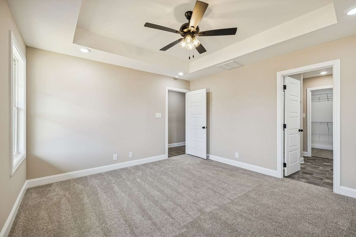 Sample pictures of a previous build showing the Meg Floor Plan.  Materials and Colors are subject to change without notice.