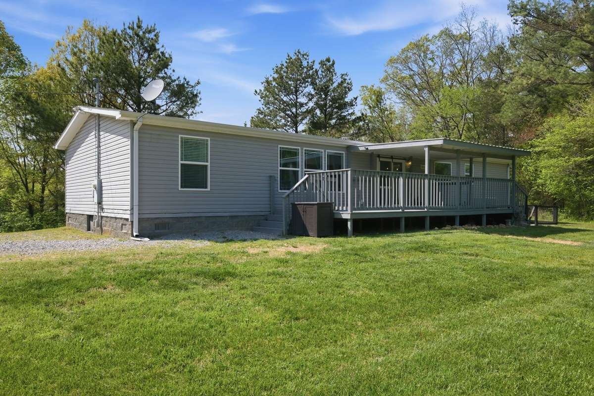 The back deck also offers an uncovered space for grilling or sunning!