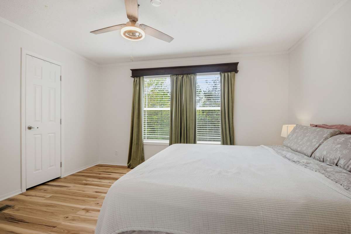 Primary bedroom easily hosts a king size bed! Also, TWO SEPARATE closets for added space!