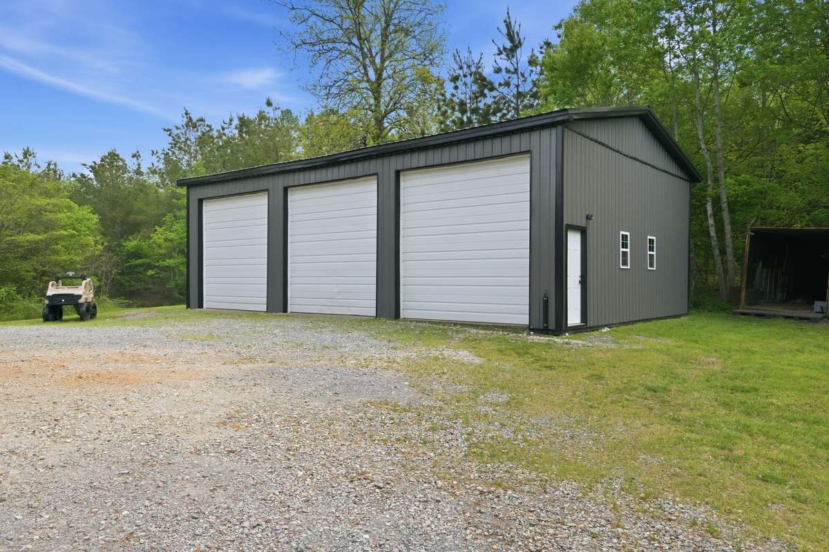 12 foot bay doors create AMPLE space for large toys that need to go in and out of the garage!