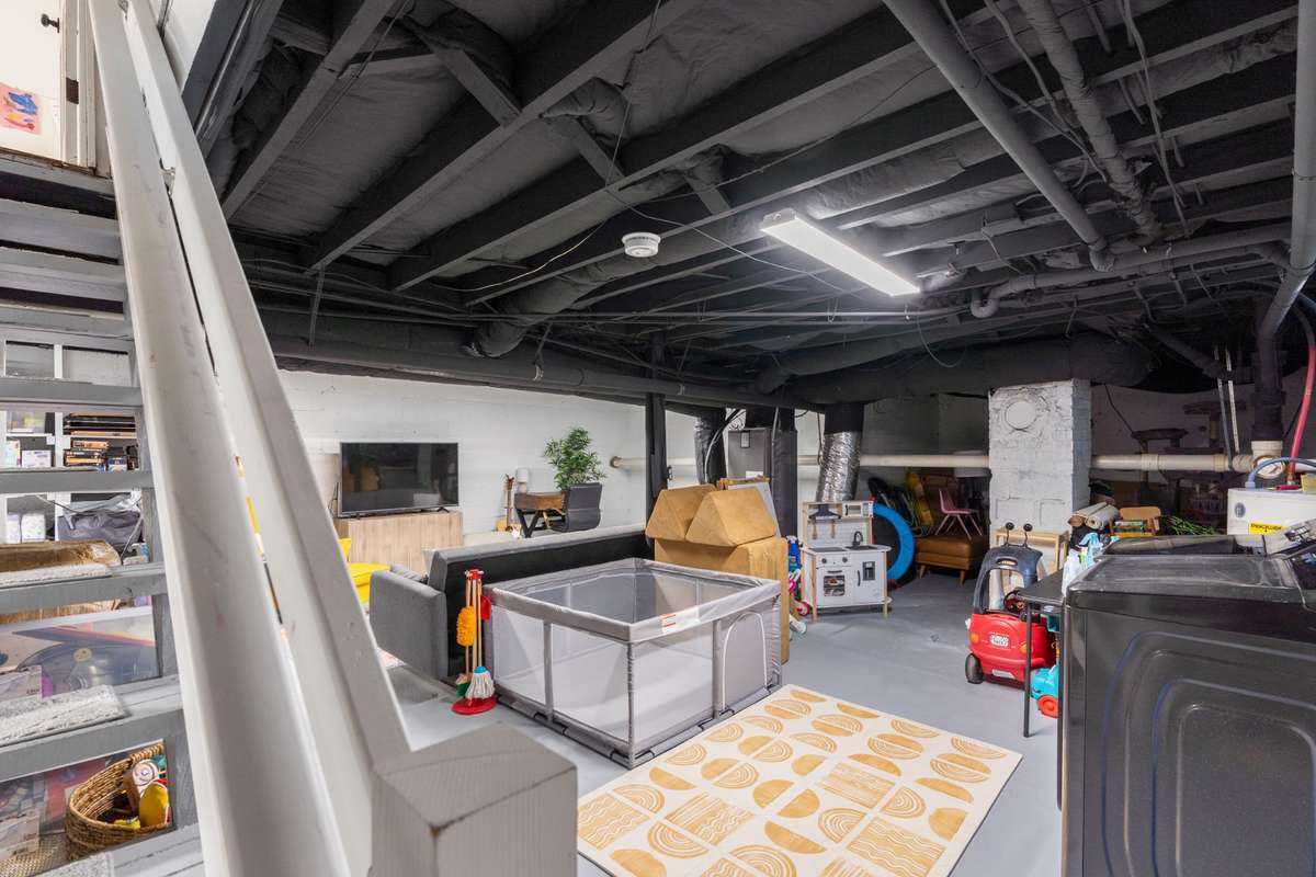 Unfinished area in the basement...stays cool year round. Washer and dryer are located in this area.