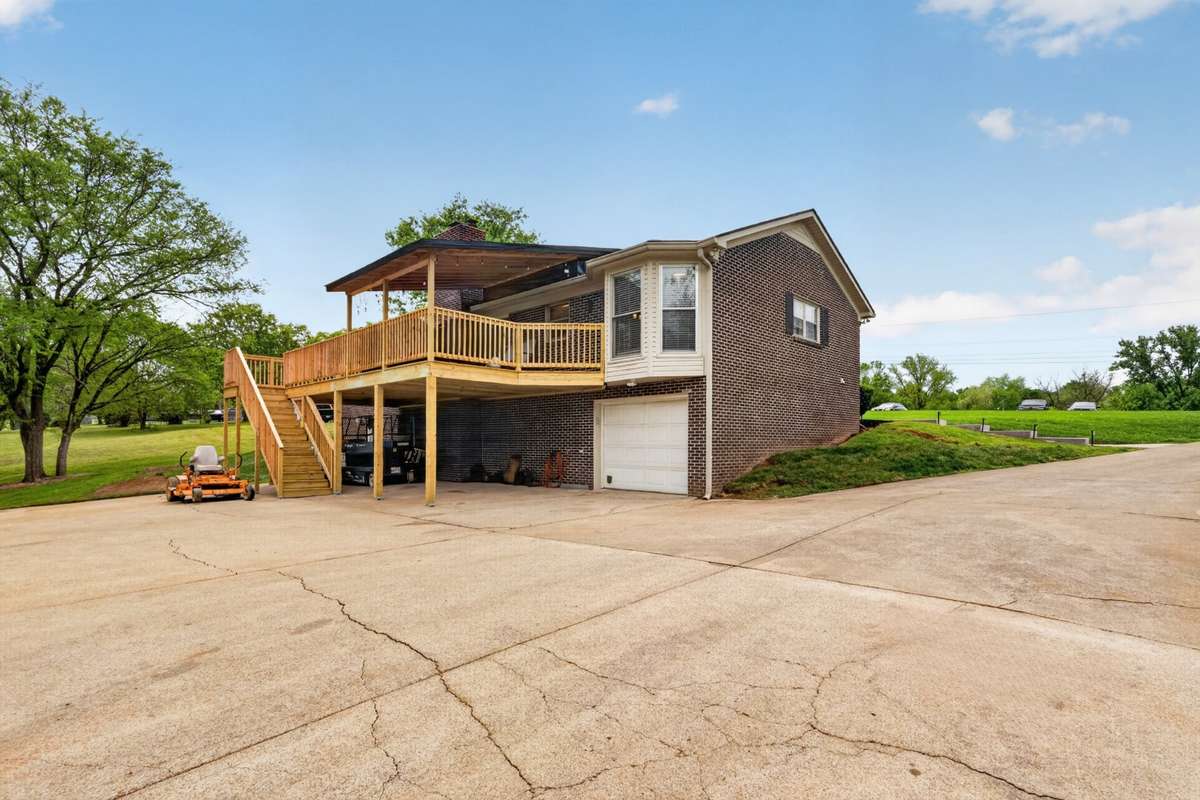 Ample parking and play area in the driveway.