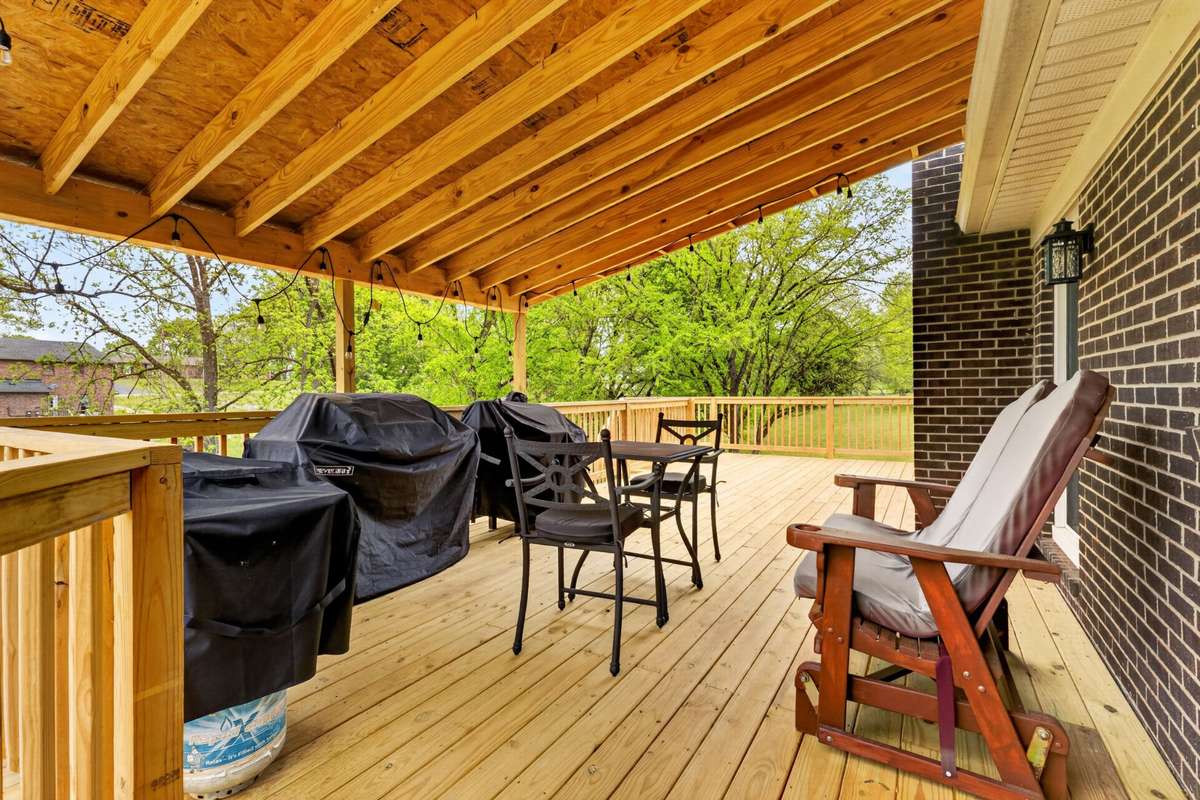 Step from the eat-in area to the new covered deck. What a great place to relax.