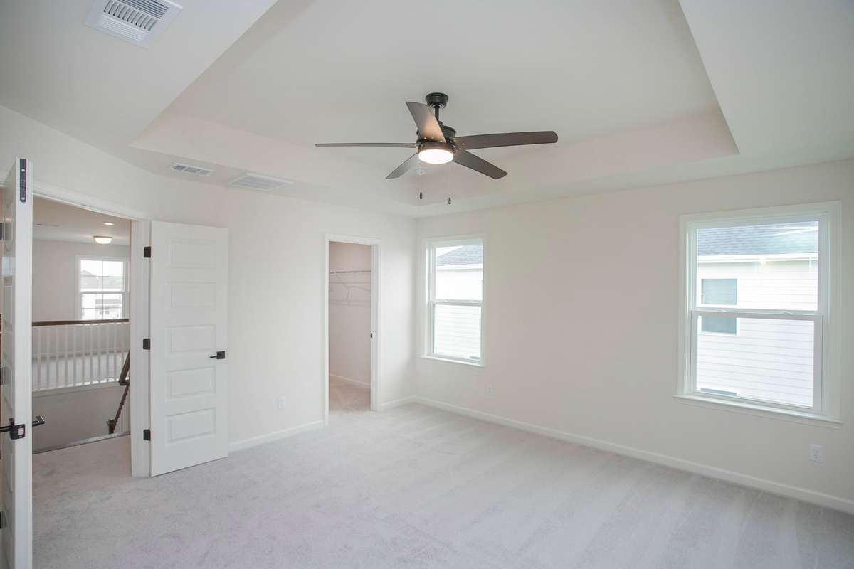 2 separate closets in this Primary Suite. All photos are of model home*