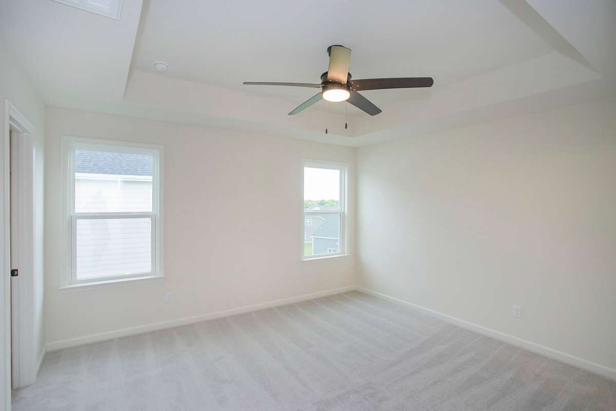 Primary Bedroom. All photos are of model home*