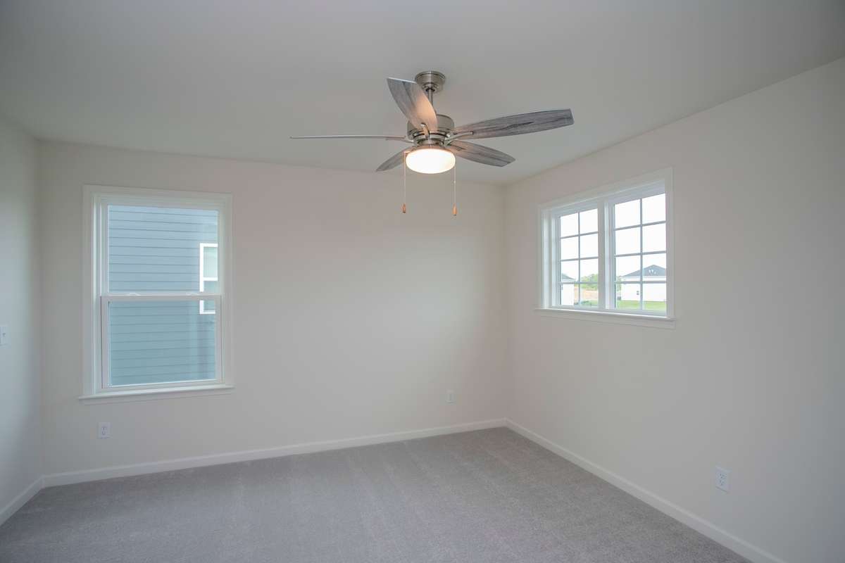 Bedroom 3 of 4. All photos are of model home*