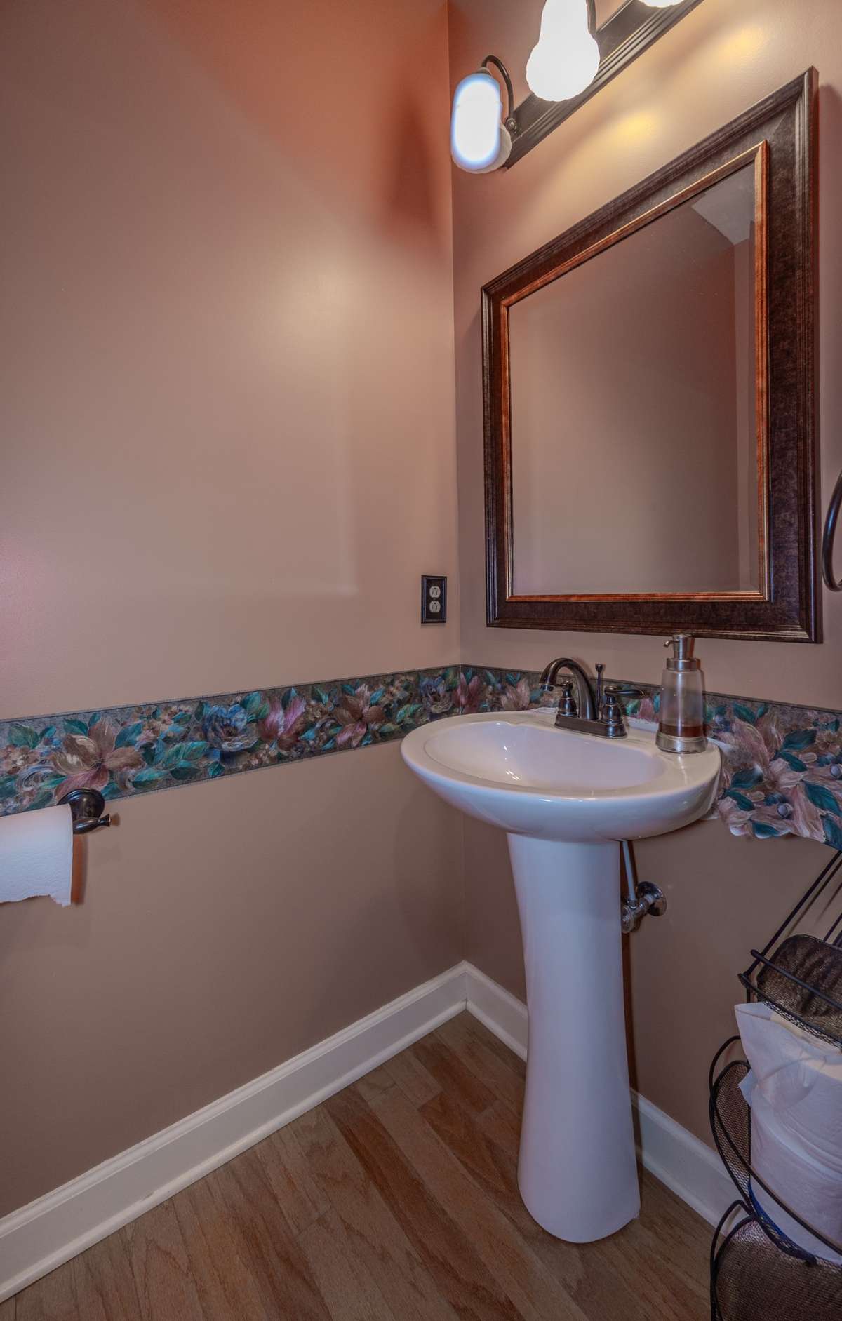 Half bath located just off the foyer.