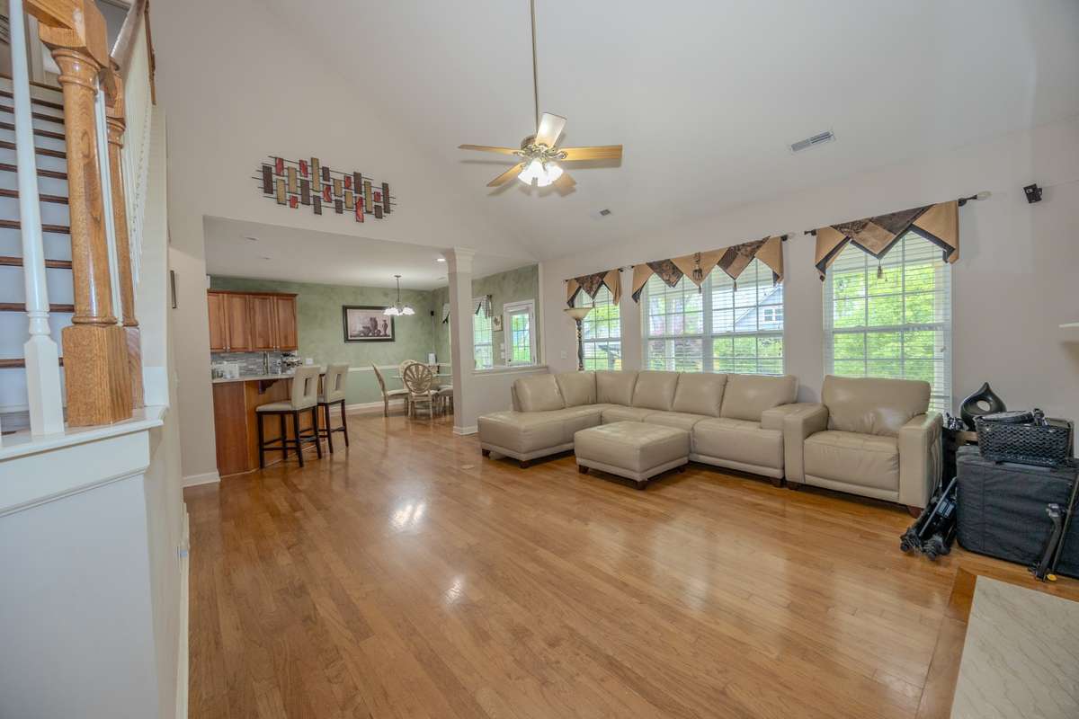 Large living room with soaring ceilings.