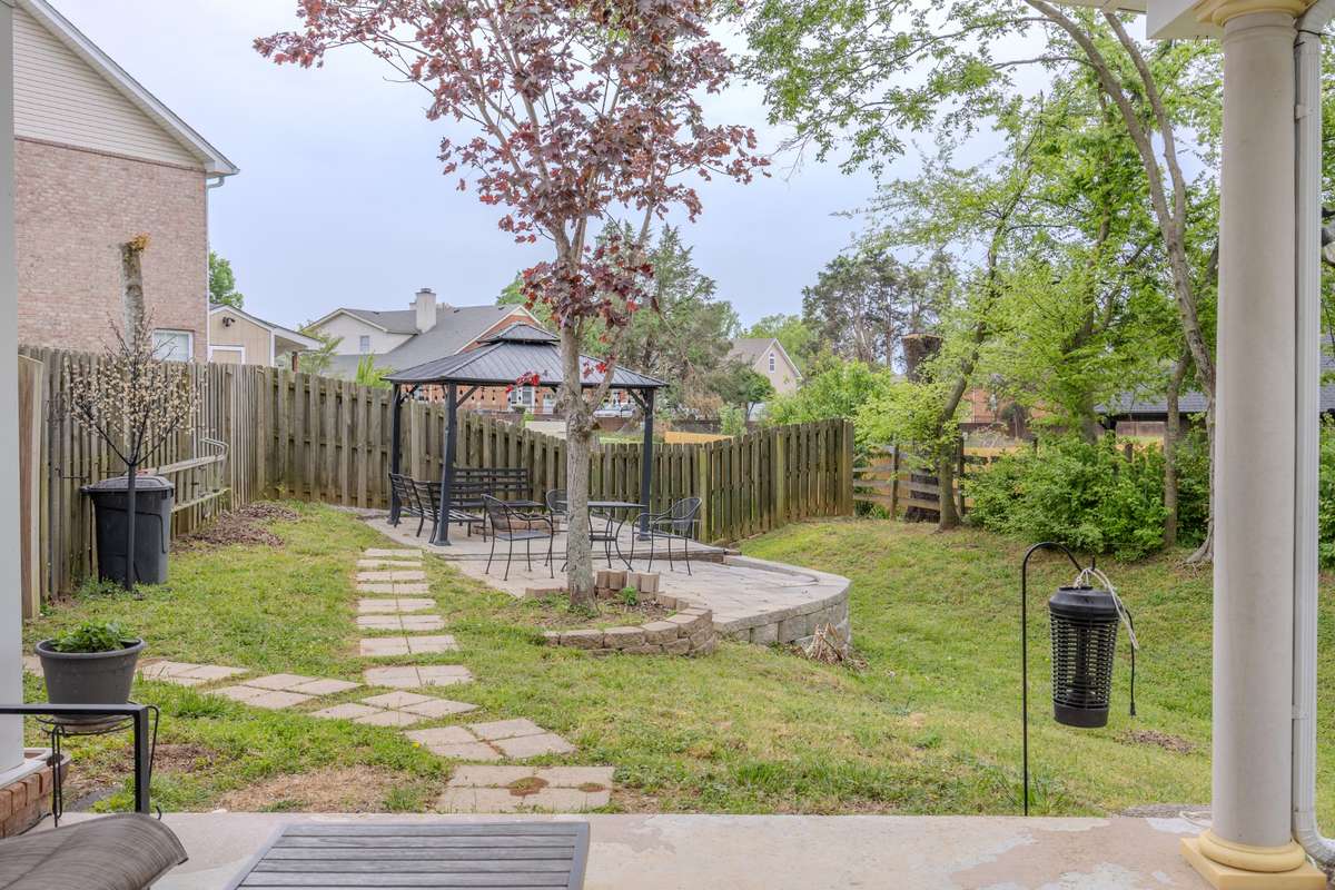 Path to gazebo and fire pit from back porch.