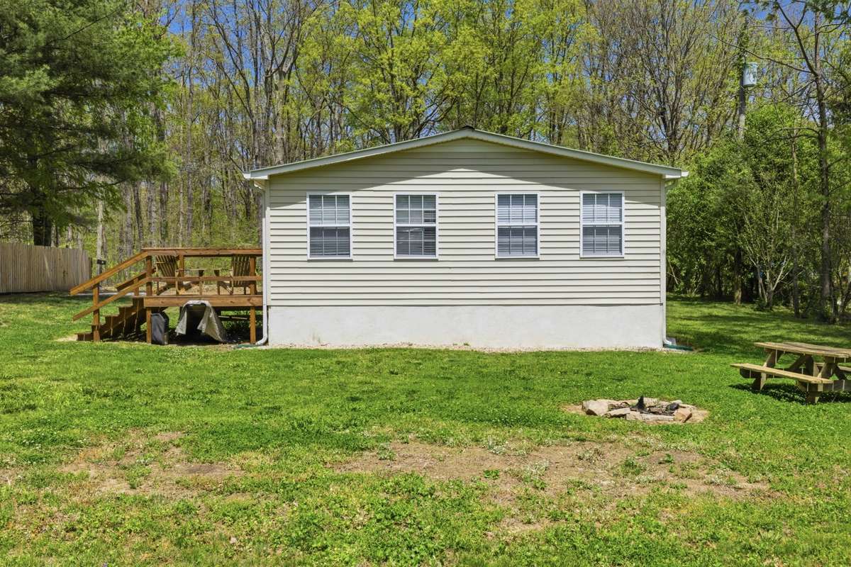 Backyard invites you to embrace Tennessee life: Picnic dinner outside followed by a bonfire