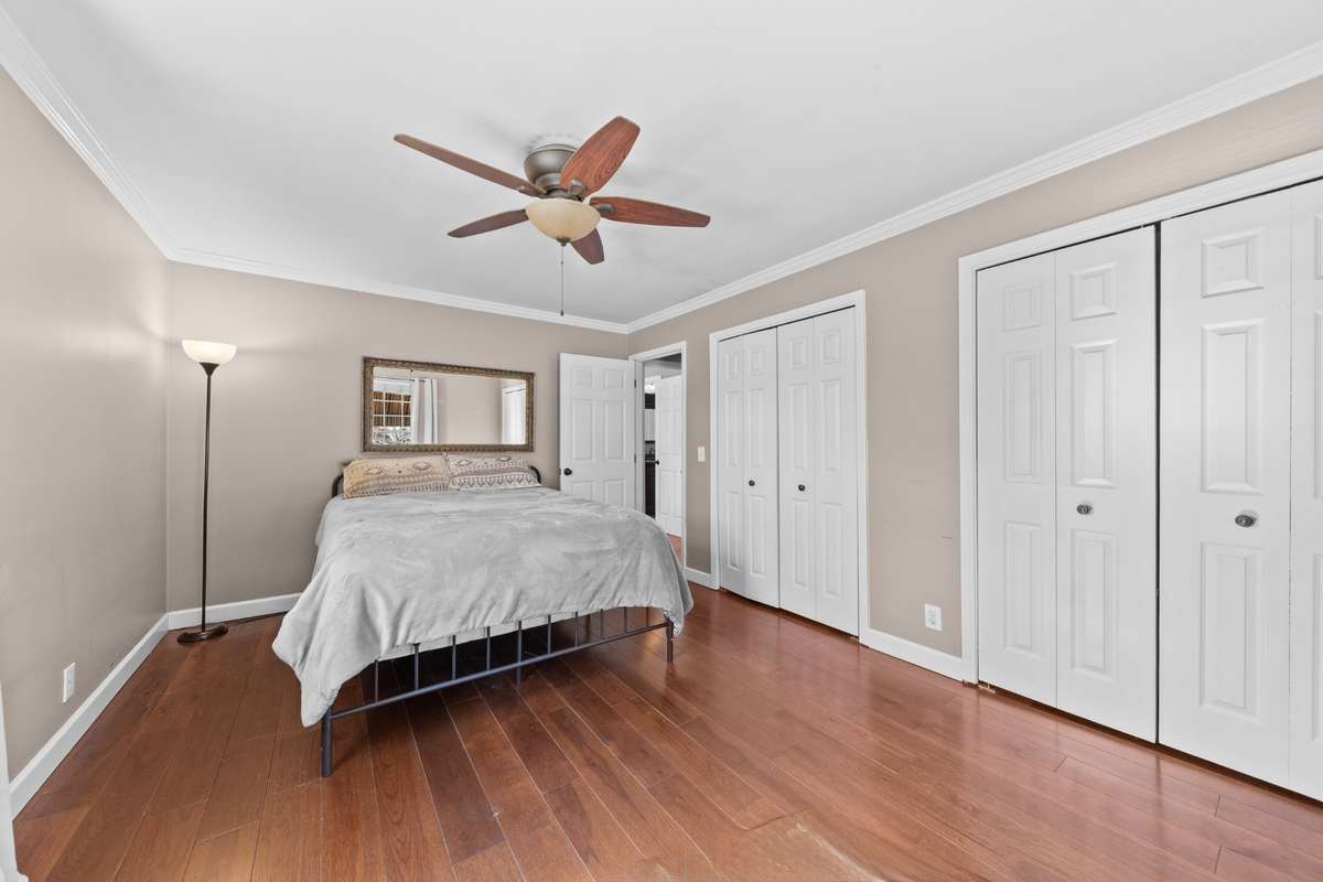 Bedroom 3 with wood flooring and extra closet space. (12x11)
