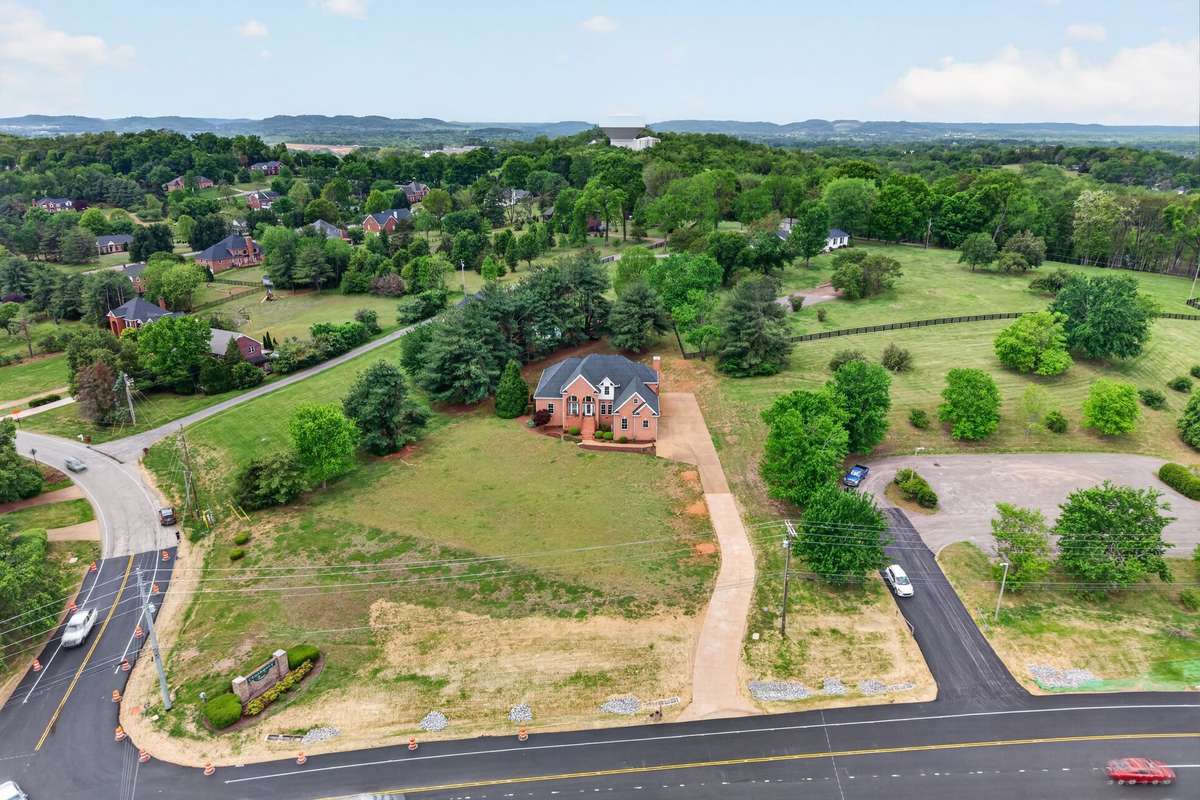 Sitting on 1.3 acres with no HOA. Freshly paved road in front where work is almost finished.