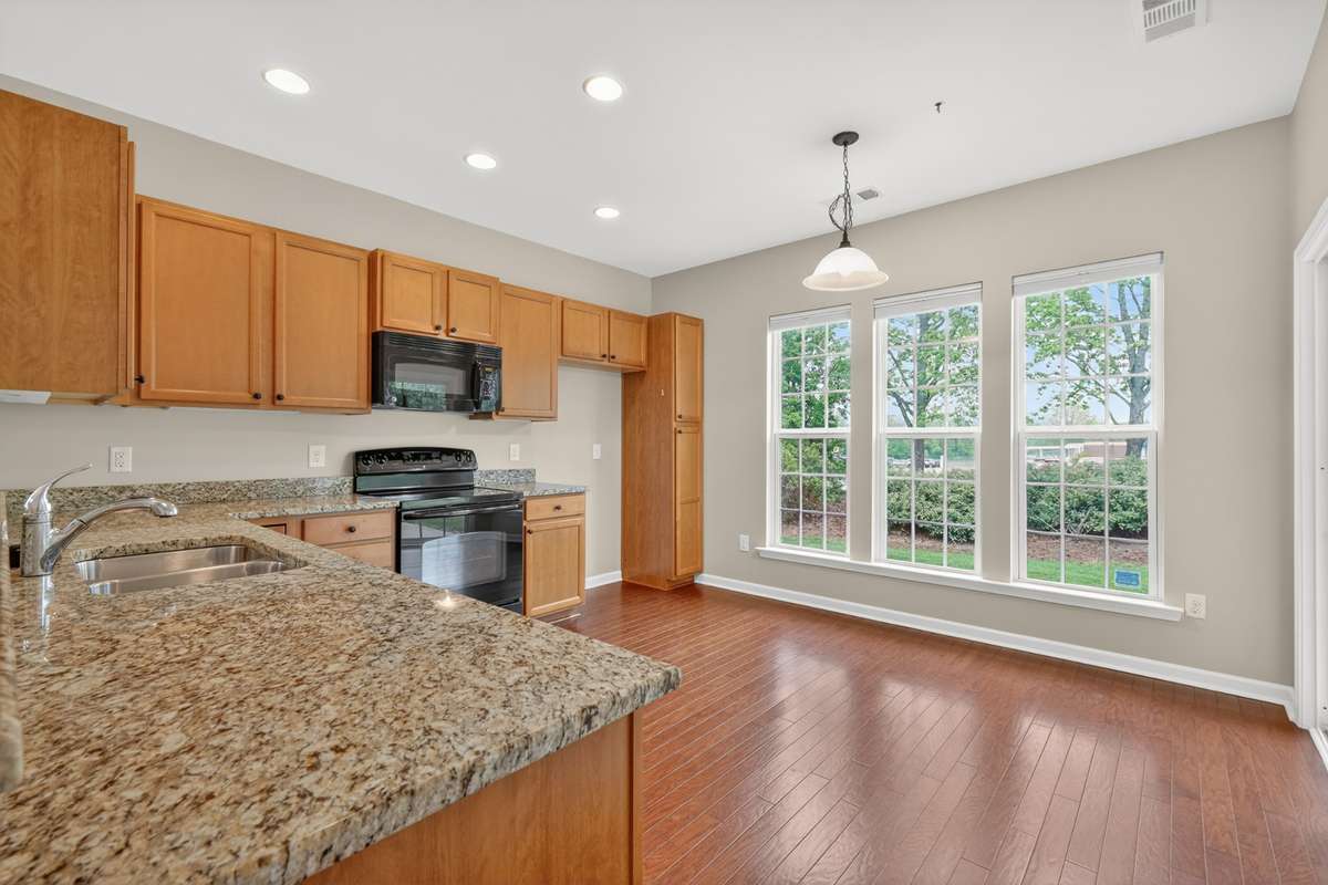 Generously sized kitchen with room for a small eat in nook area