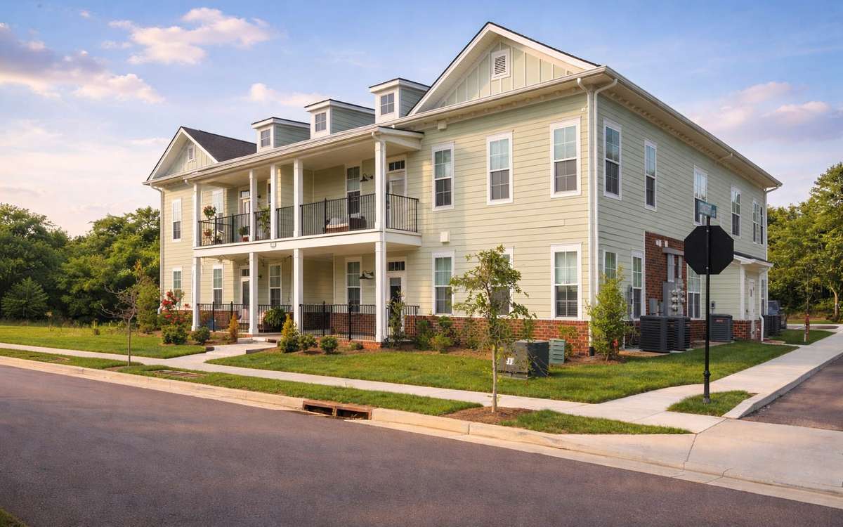Experience the convenience of the first-floor corner unit that looks out at tree-lined green space, where you can open the windows and enjoy peaceful nights.