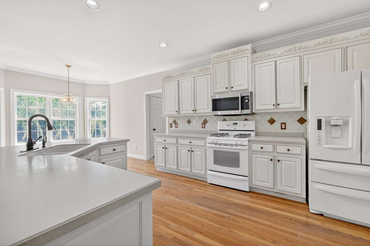 Gleaming white custom cabinetry