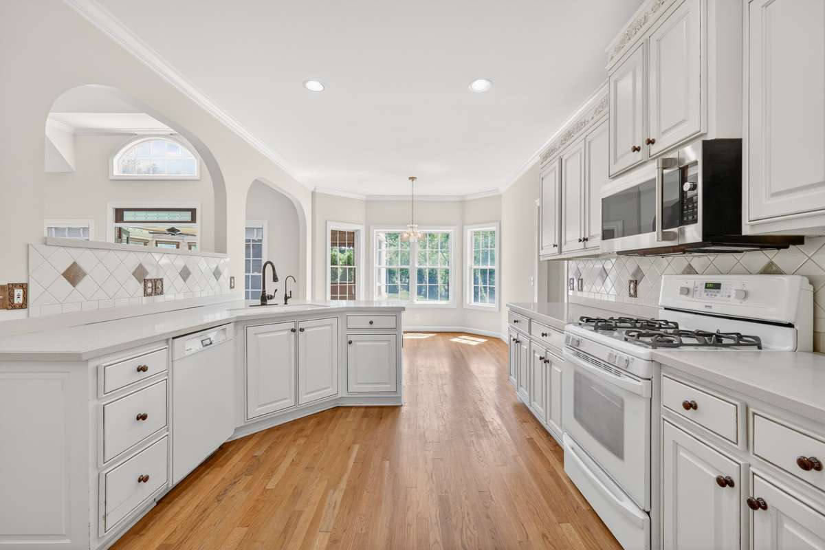 Gleaming white custom cabinetry