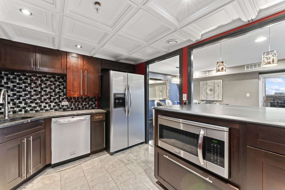 Cabinet access to washer/dryer all in one hookup.