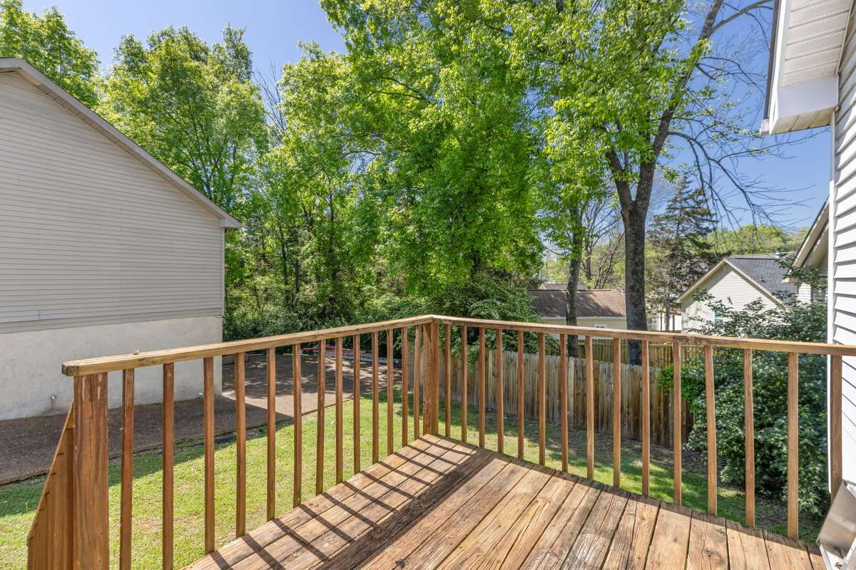 Deck to back/side yard off of the Kitchen.