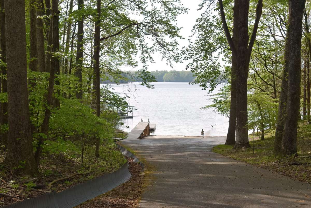 Members of the HOA in Pine Bluff Cabin Site Development can use this boat ramp and dock.