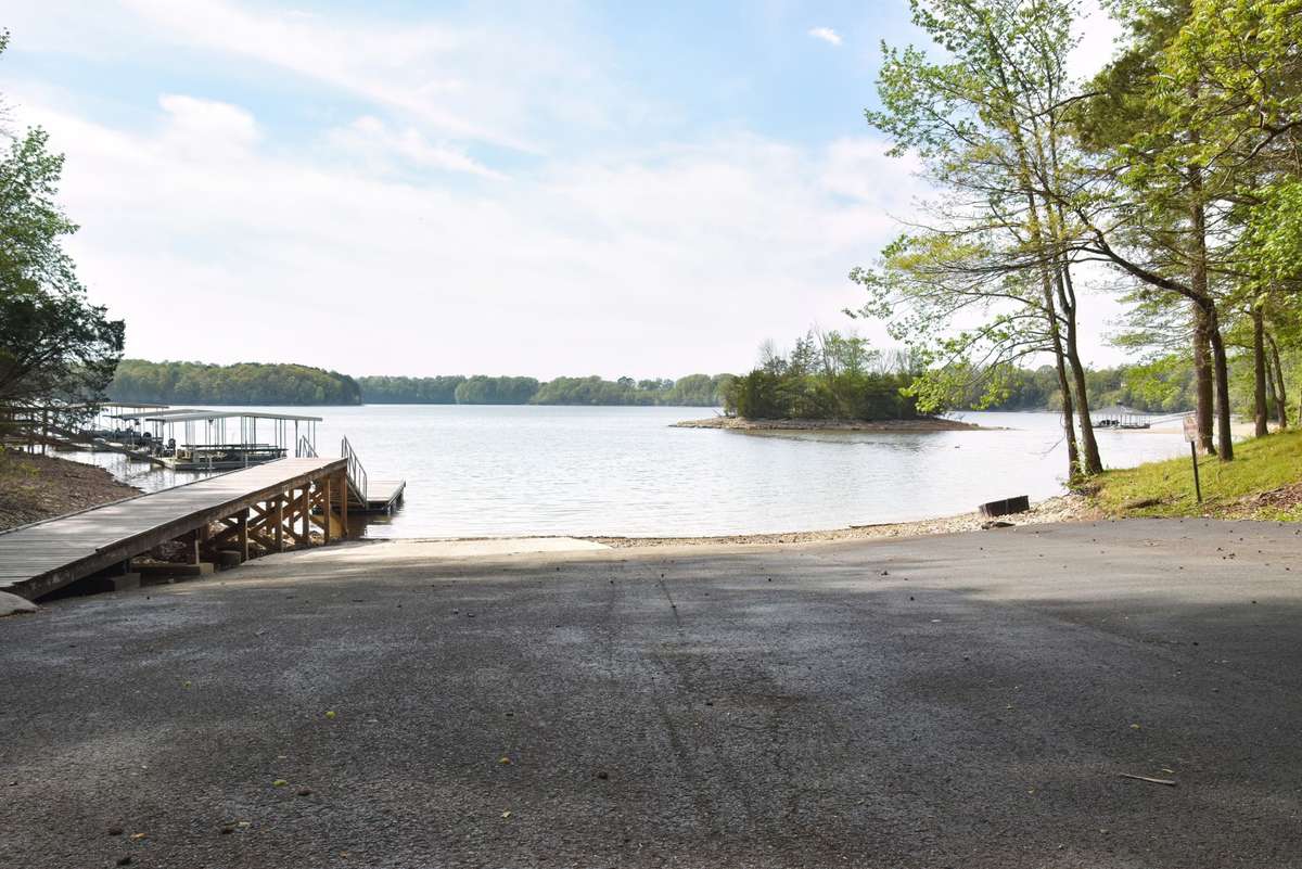 Members of the HOA in Pine Bluff Cabin Site Development can use this boat ramp and dock.