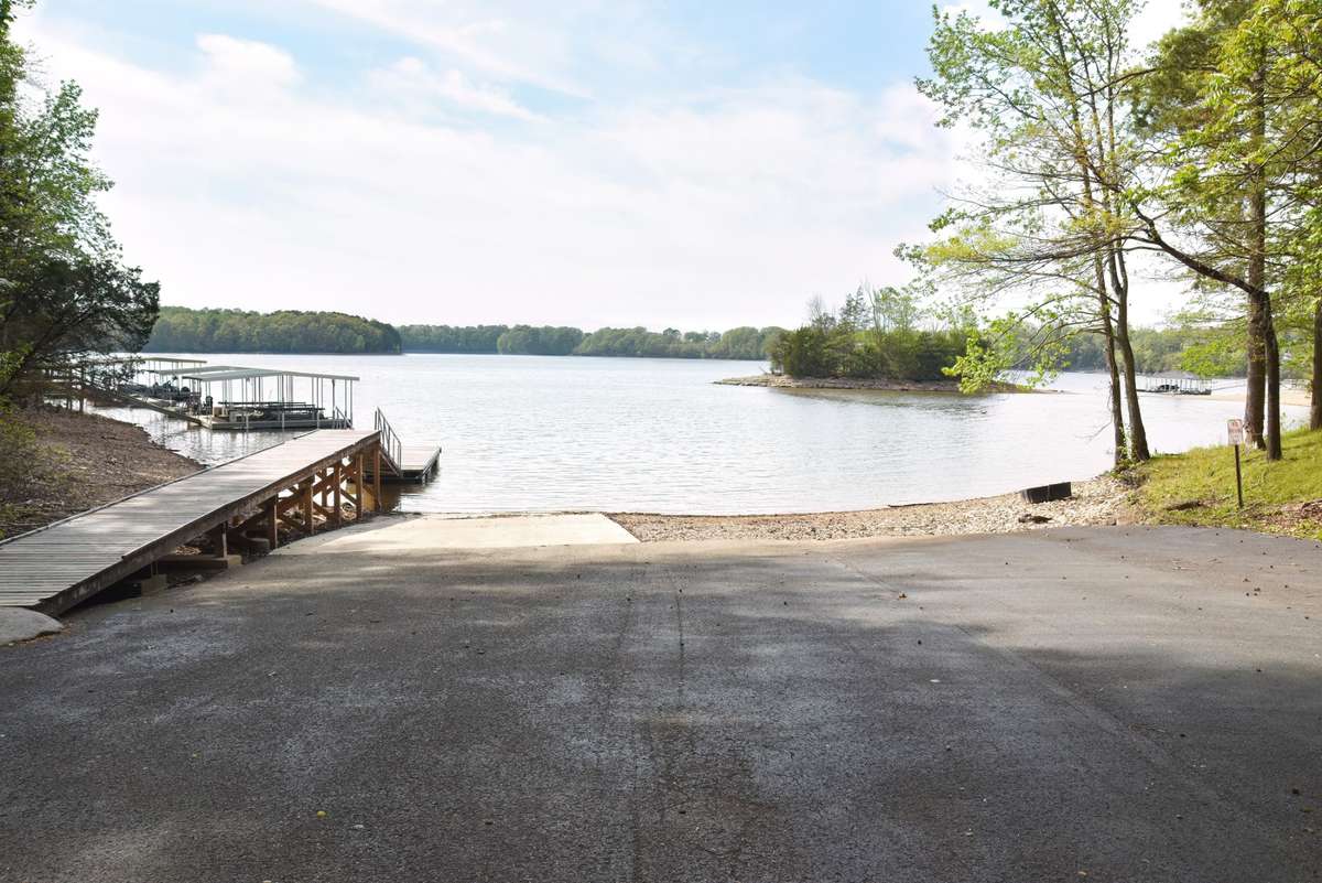 Members of the HOA in Pine Bluff Cabin Site Development can use this boat ramp and dock.