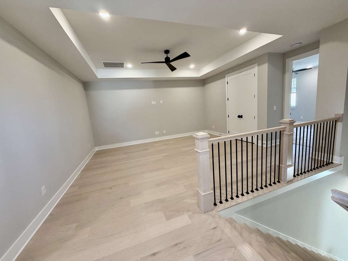 Actual Home — Upstairs Bonus / Rec Room with Tray Ceiling