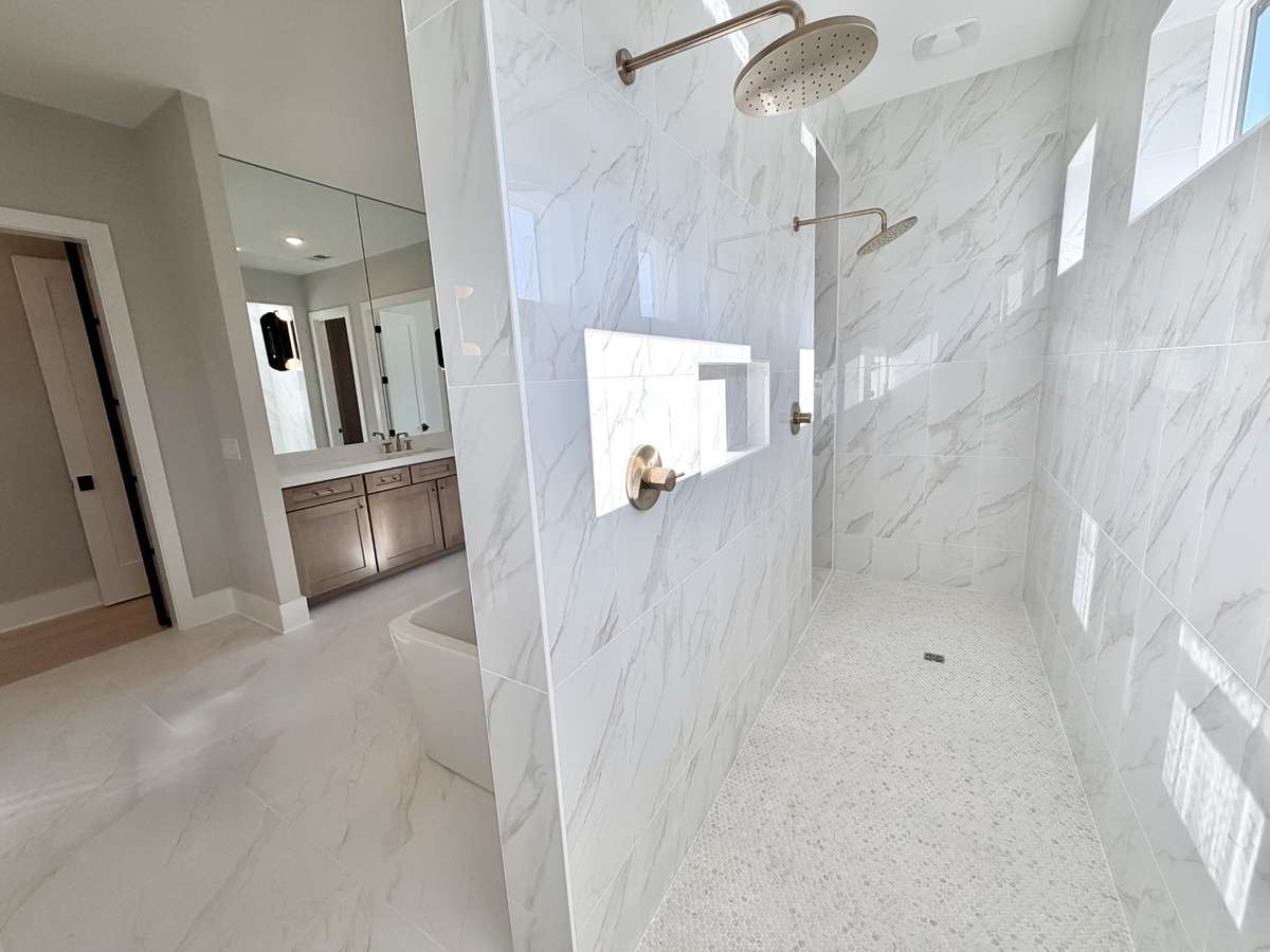 Actual Home — Primary Luxury Shower with Dual Shower Heads & Natural Light