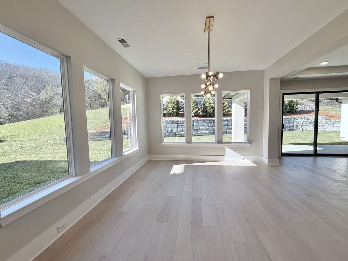 Actual Home — Dining | Main Level Recreation Room