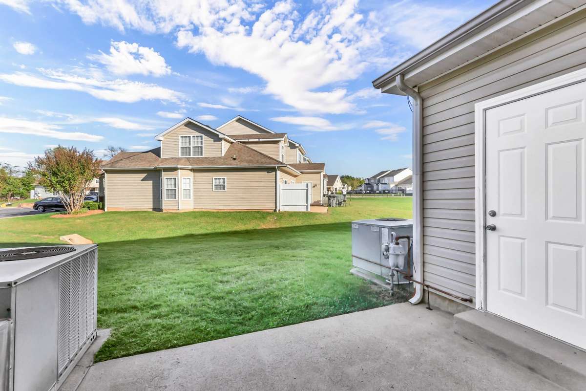 The pool is just a short distance around the corner from the back door.