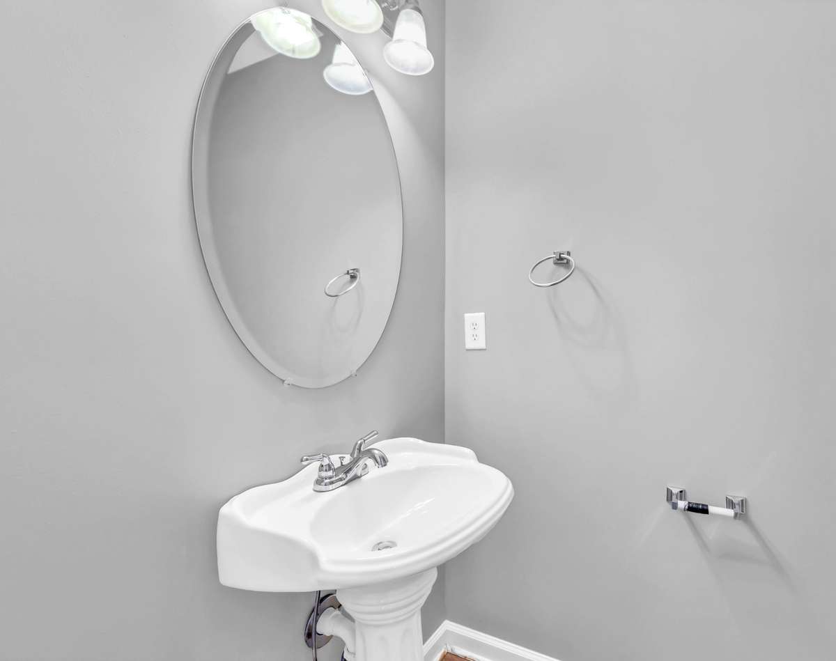 The powder room is very convenient downstairs.