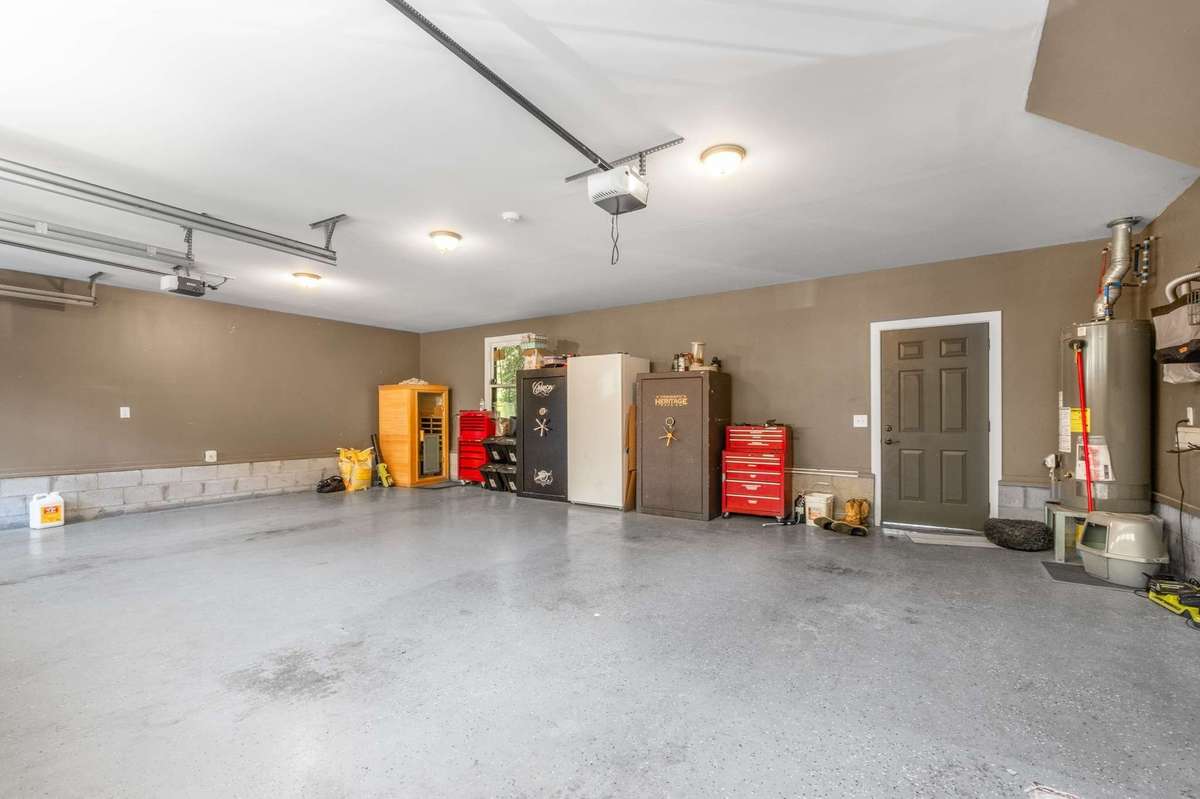 3 car garage with epoxy floor