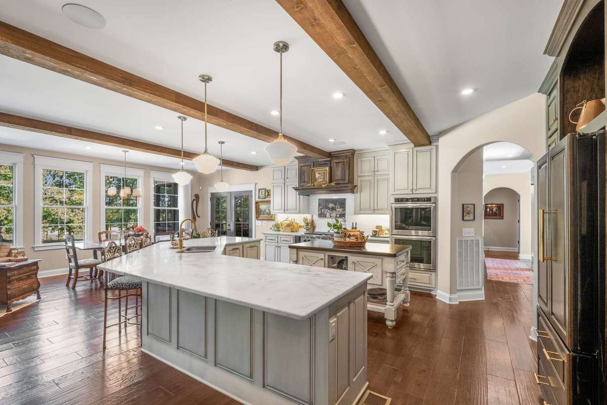 Double ovens and central prep island - whole house audio including the kitchen